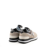 New Balance Sneakers Donna 574 Bianco Sporco Con Dettagli Maculati