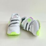 New Balance 574 Sneakers Bambina In Pelle Ghiaccio E Verde Fluo