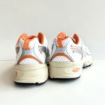 New Balance 530 Sneakers Unisex Bianco E Arancio