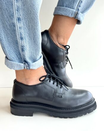 Janet E Janet Stringata Donna In Pelle Nera